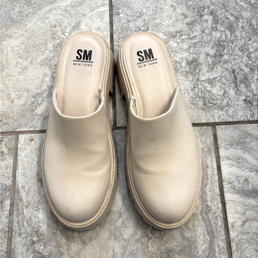 Cream clogs